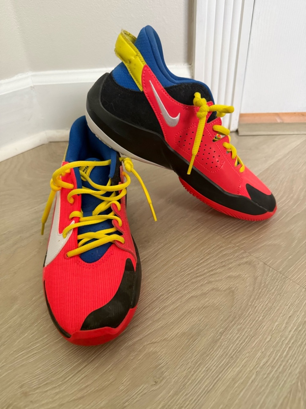 Nike Kids Red/Yellow/Blue Low-Top Sneakers/ women’s 8